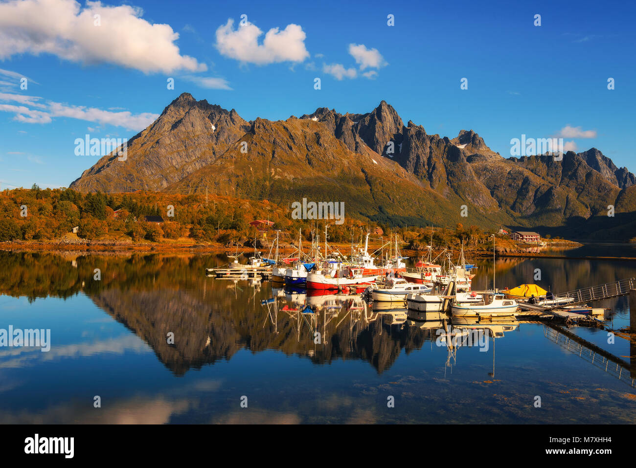 Fishing boats and yachts on Lofoten islands in Norway Stock Photo