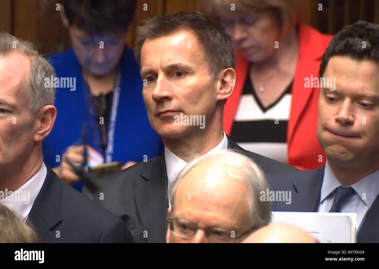 Health Secretary Jeremy Hunt, listens as Chancellor of the Exchequer ...