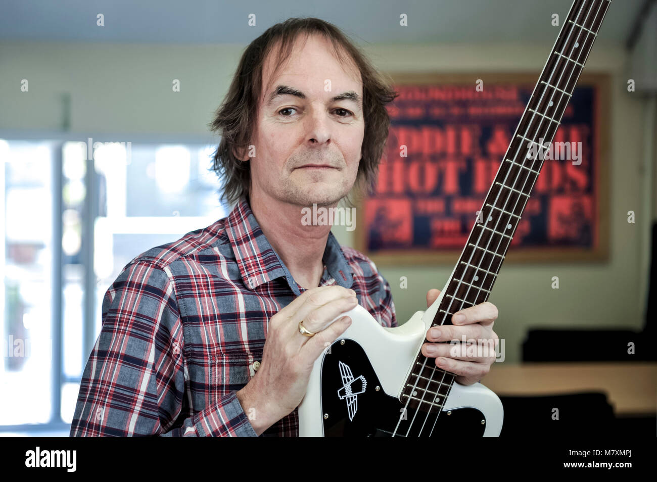 Guitarist Paul Grey(b1957) now suffers from Tinnitus after year of playing in rock bands including Eddie and the Hot Rods and the Damned. Stock Photo