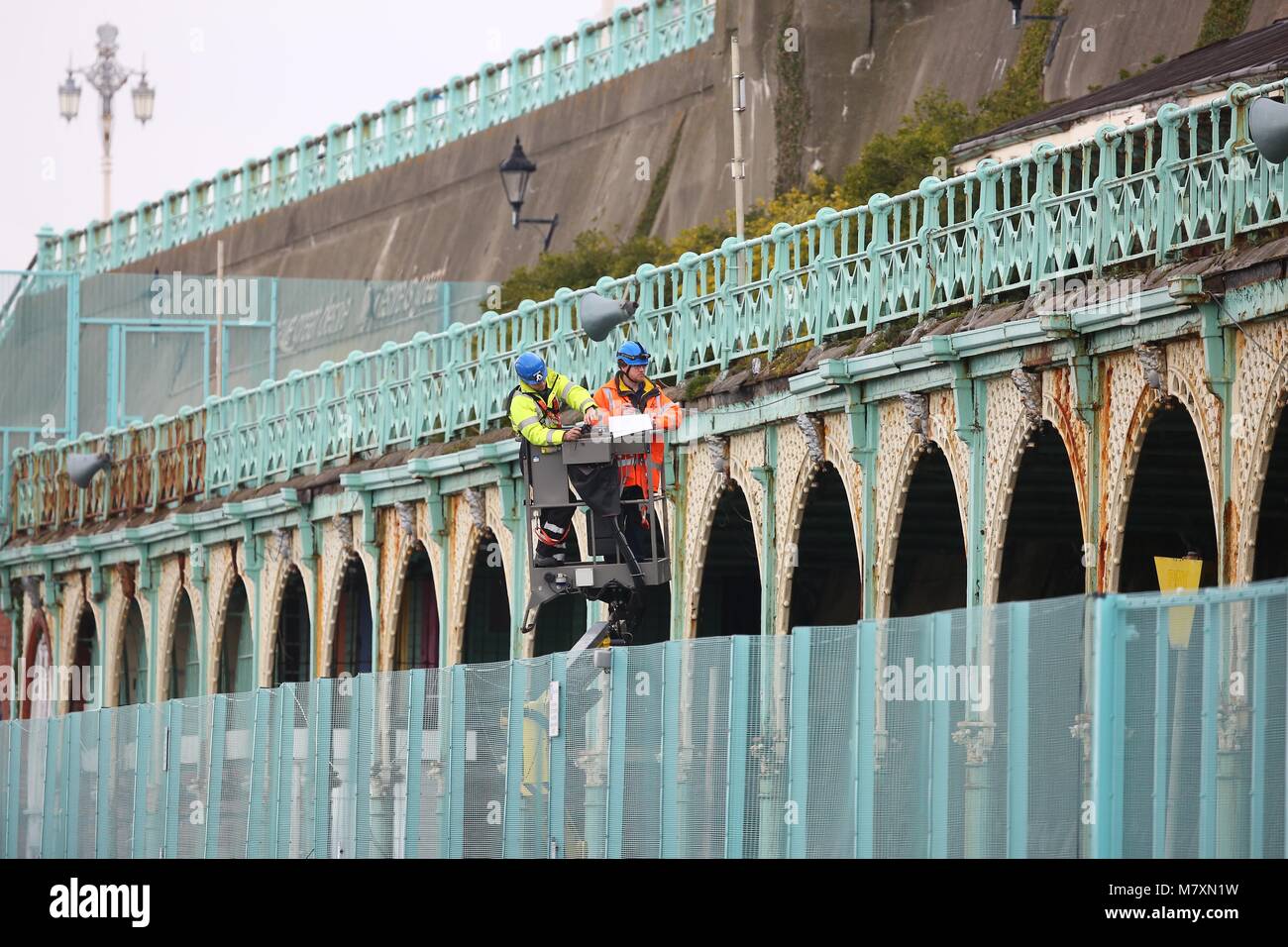 Surveyors examine the iron work on Madeira Terrace on Brighton seafront ...