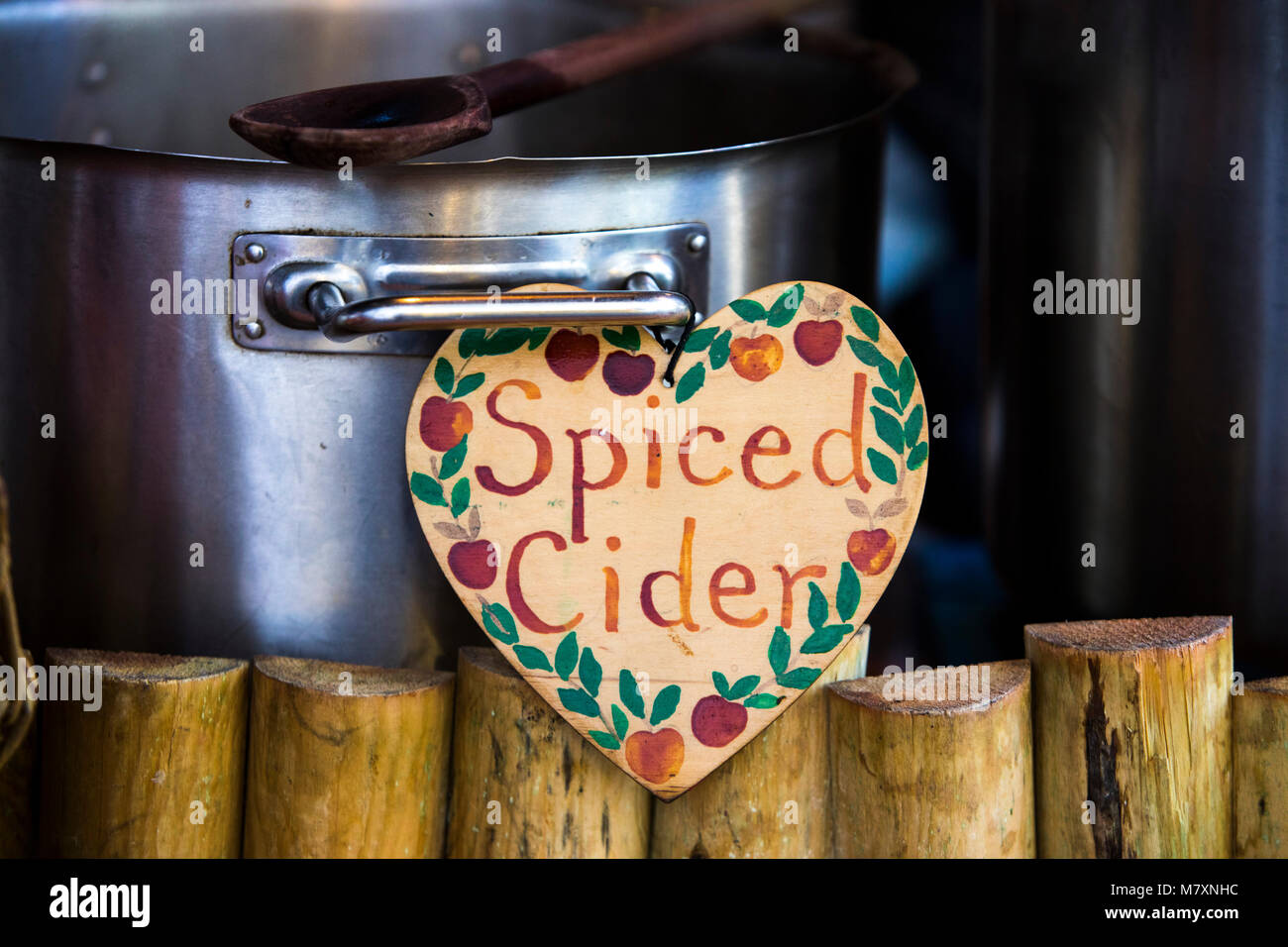 Christmas festive hot drinks on sale at market - spiced cider. Stock Photo
