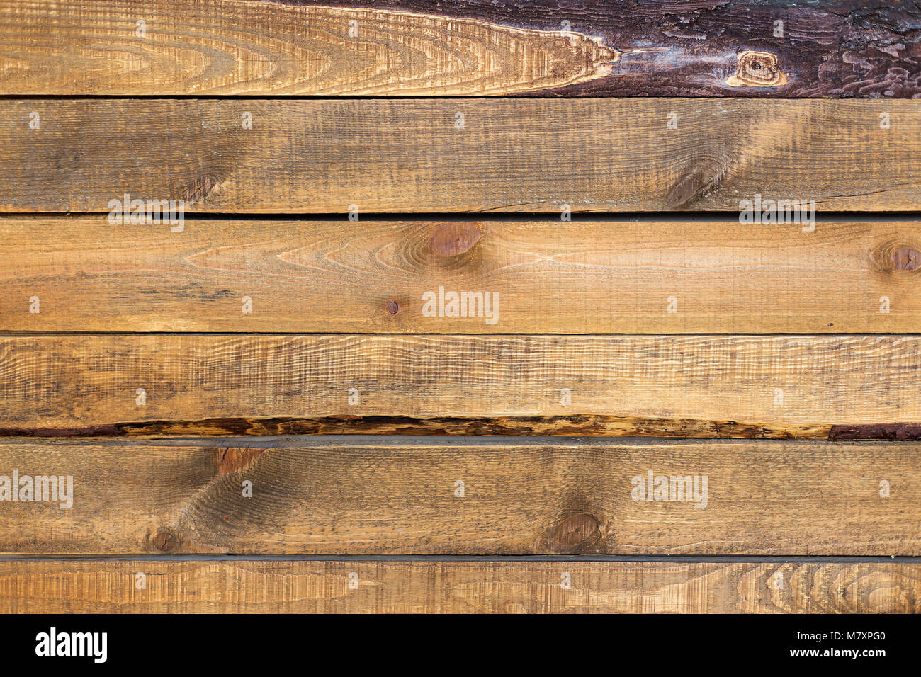 rough wooden brown background on boards is visible at the edges of the ...