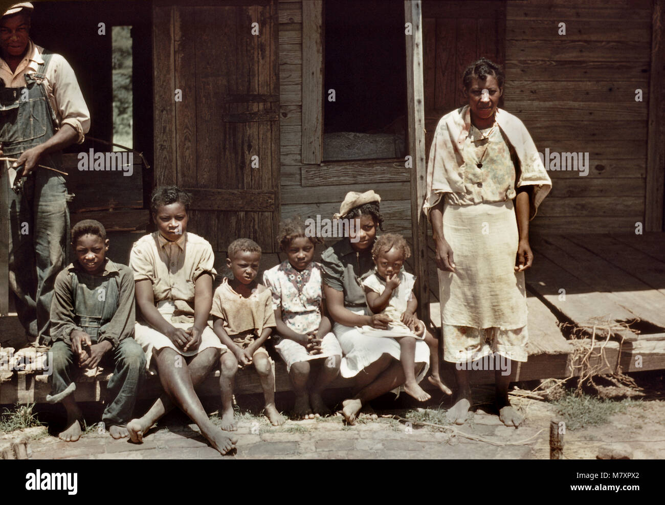 Family Portrait on Porch, Bayou Bourbeau Plantation, FSA, Cooperative, Natchitoches, Louisiana, USA, Marion Post Wolcott for Farm Security Administration, August 1940 Stock Photo