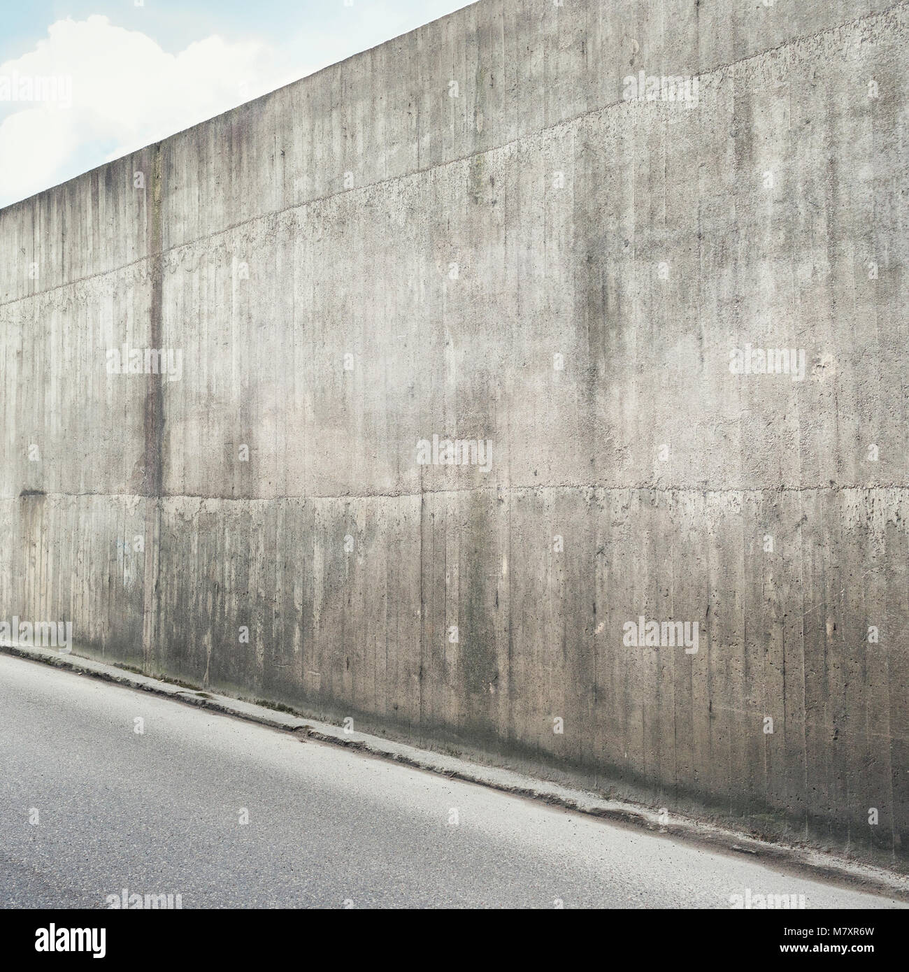 Urban background. Empty concrete wall and asphalt road Stock Photo - Alamy