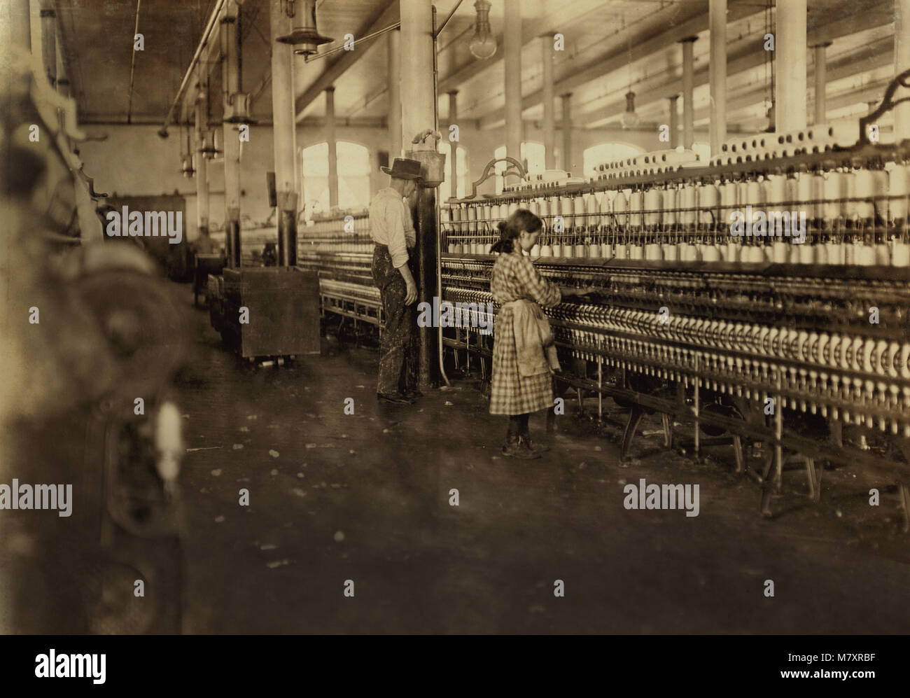Young Cotton Mill Spinner, Lancaster, South Carolina, USA, Lewis Hine for National Child Labor Committee, November 1908 Stock Photo