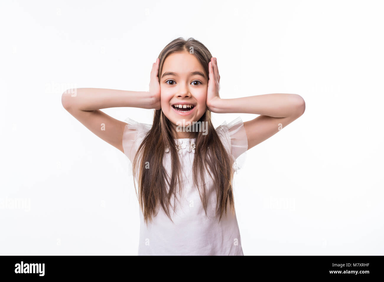 Portrait of surprised little girl on white Stock Photo - Alamy