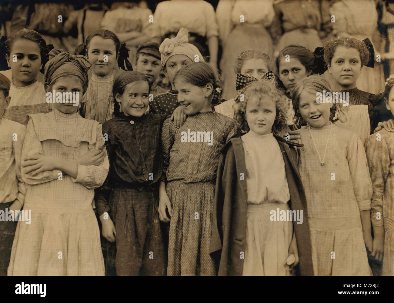 Group of Very Young Girls, Cleveland Hosiery Mills, Cleveland, Tennessee, USA, Lewis Hine for National Child Labor Committee, December 1910 Stock Photo