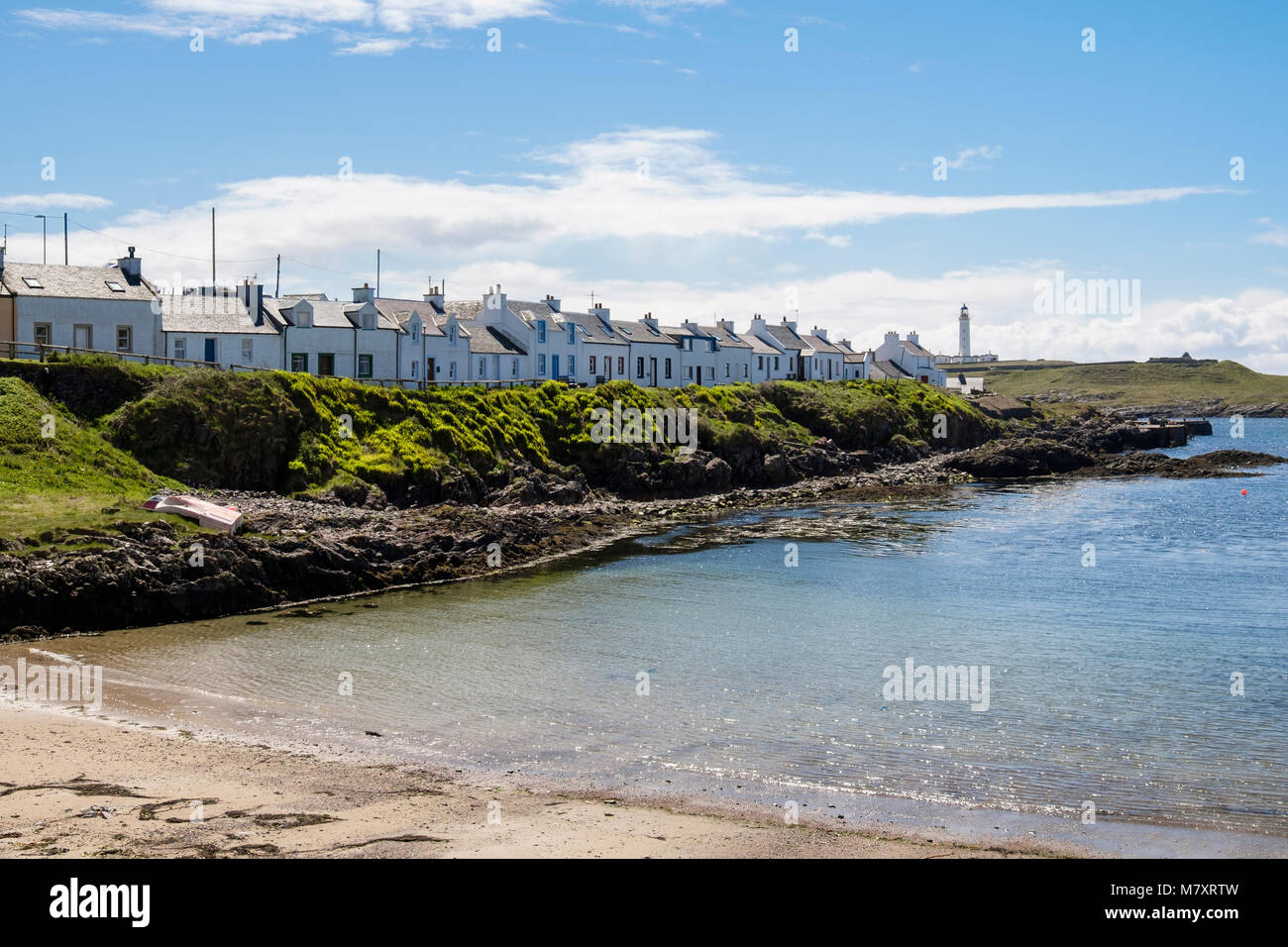 Traditional cottages around the harbour in village of Portnahaven, Isle of Islay, Argyll and Bute, Inner Hebrides, Scotland, UK, Britain Stock Photo