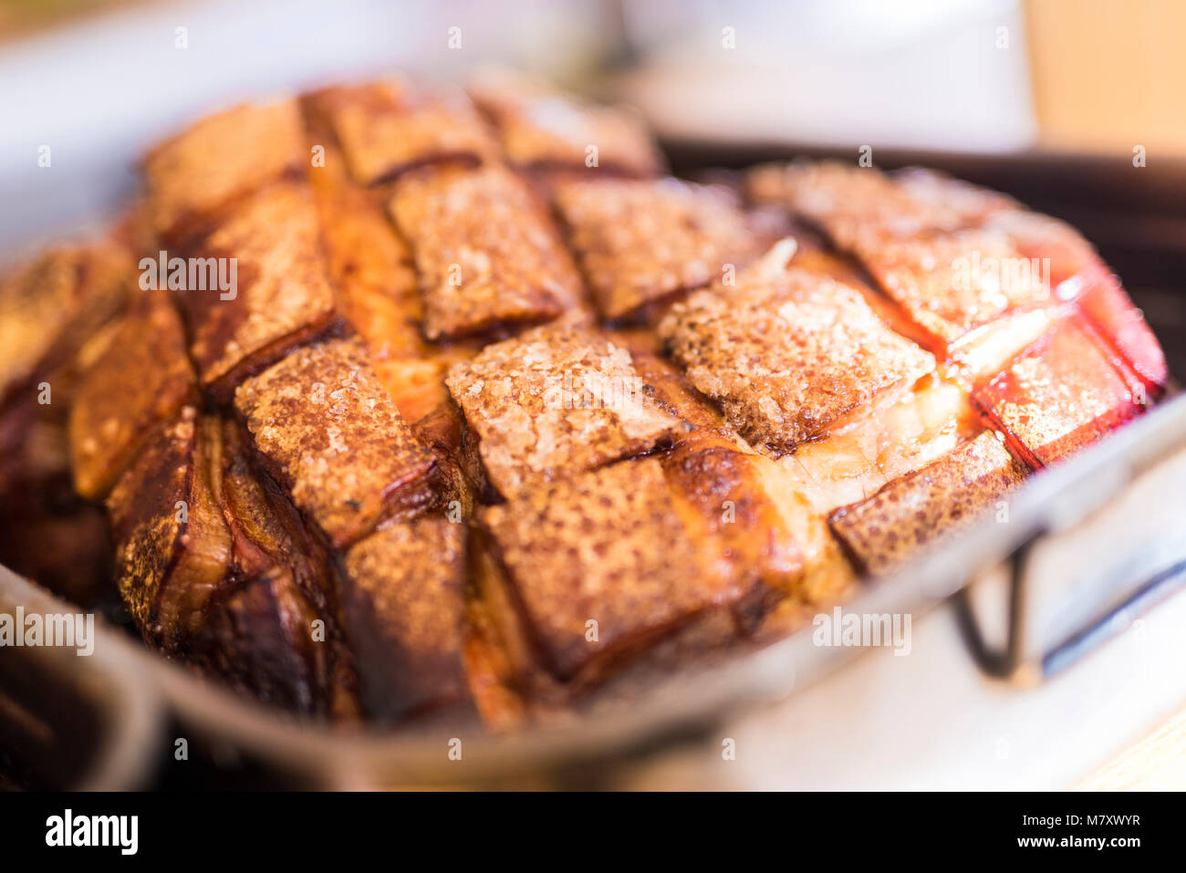 Jamón de cerdo asado en horno de leña - Roasted pork ham in a wood-burning oven Stock Photo