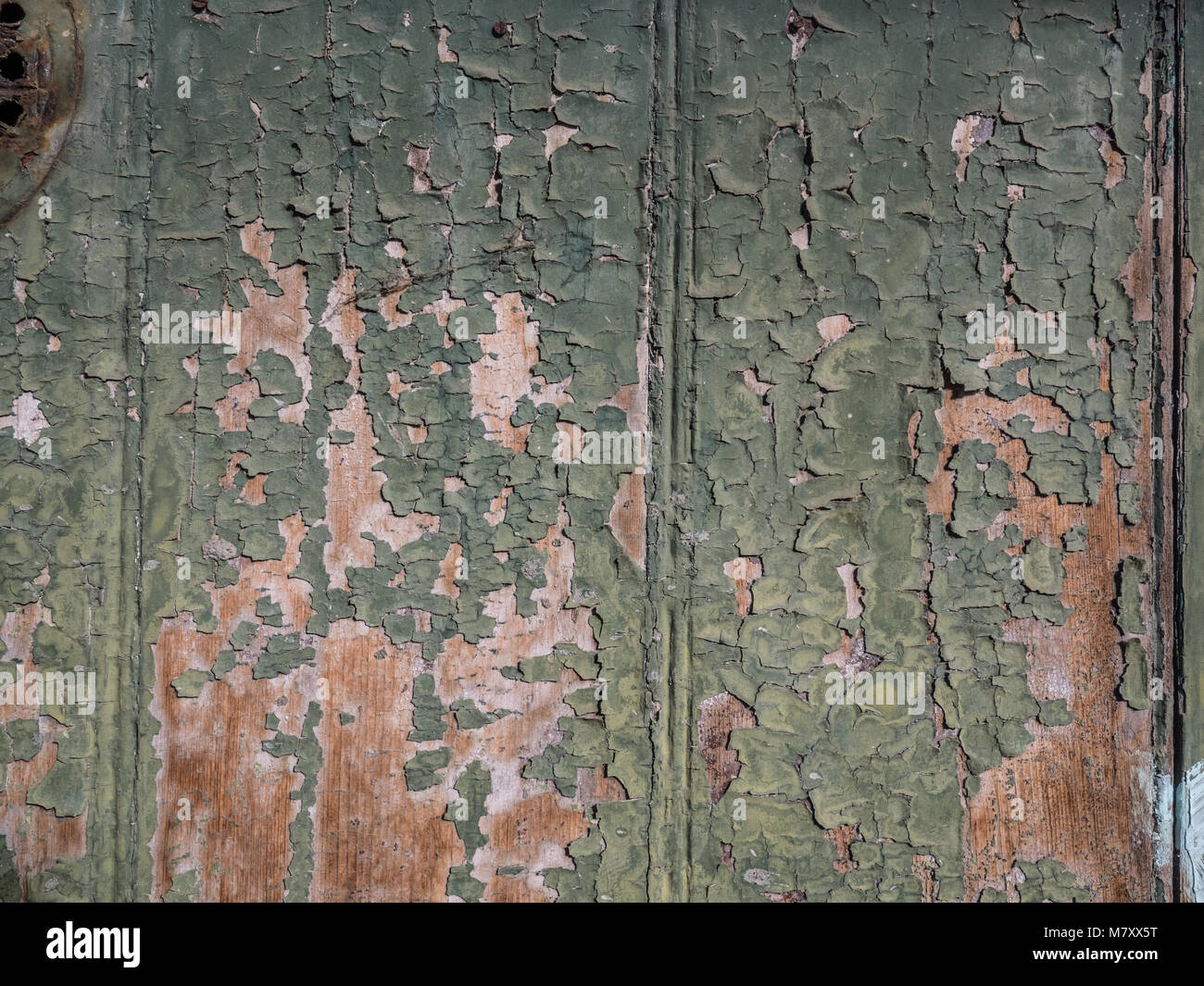 wooden surface with old paint peeling off Stock Photo