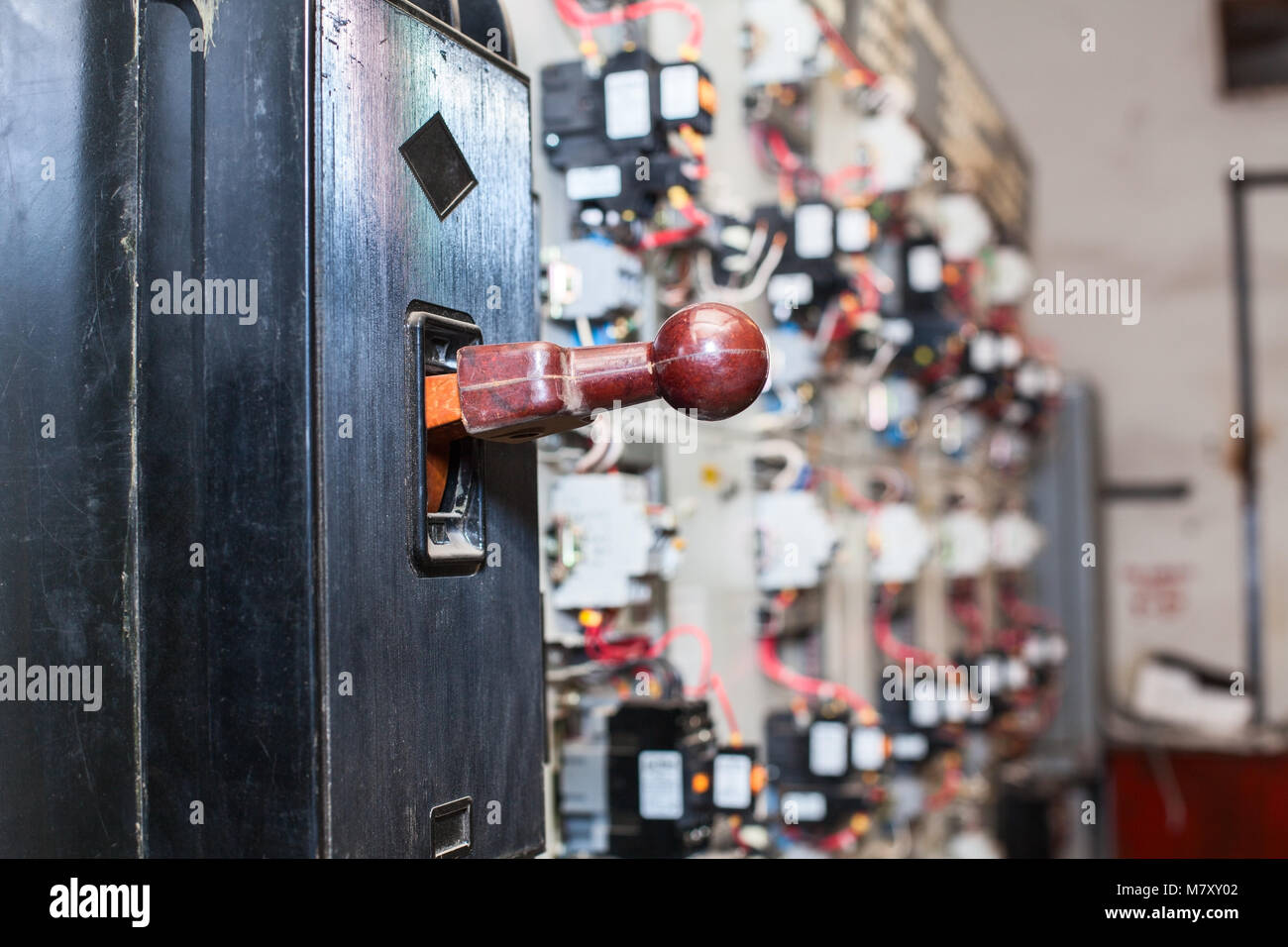 Main safety isolator switch is on shield, an industrial electric panel