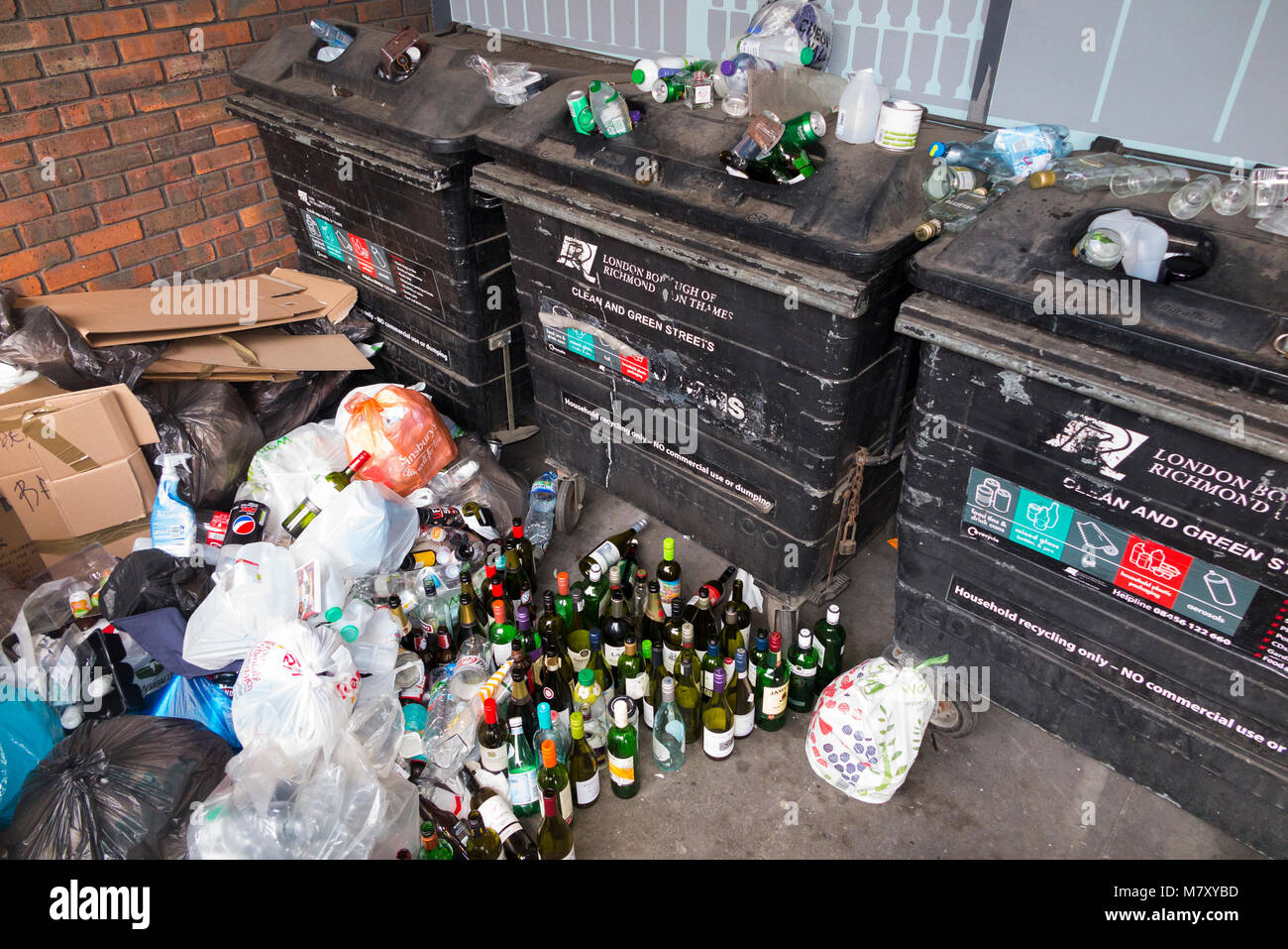 Full and overflowing / over flowing glass bottle banks and recycling