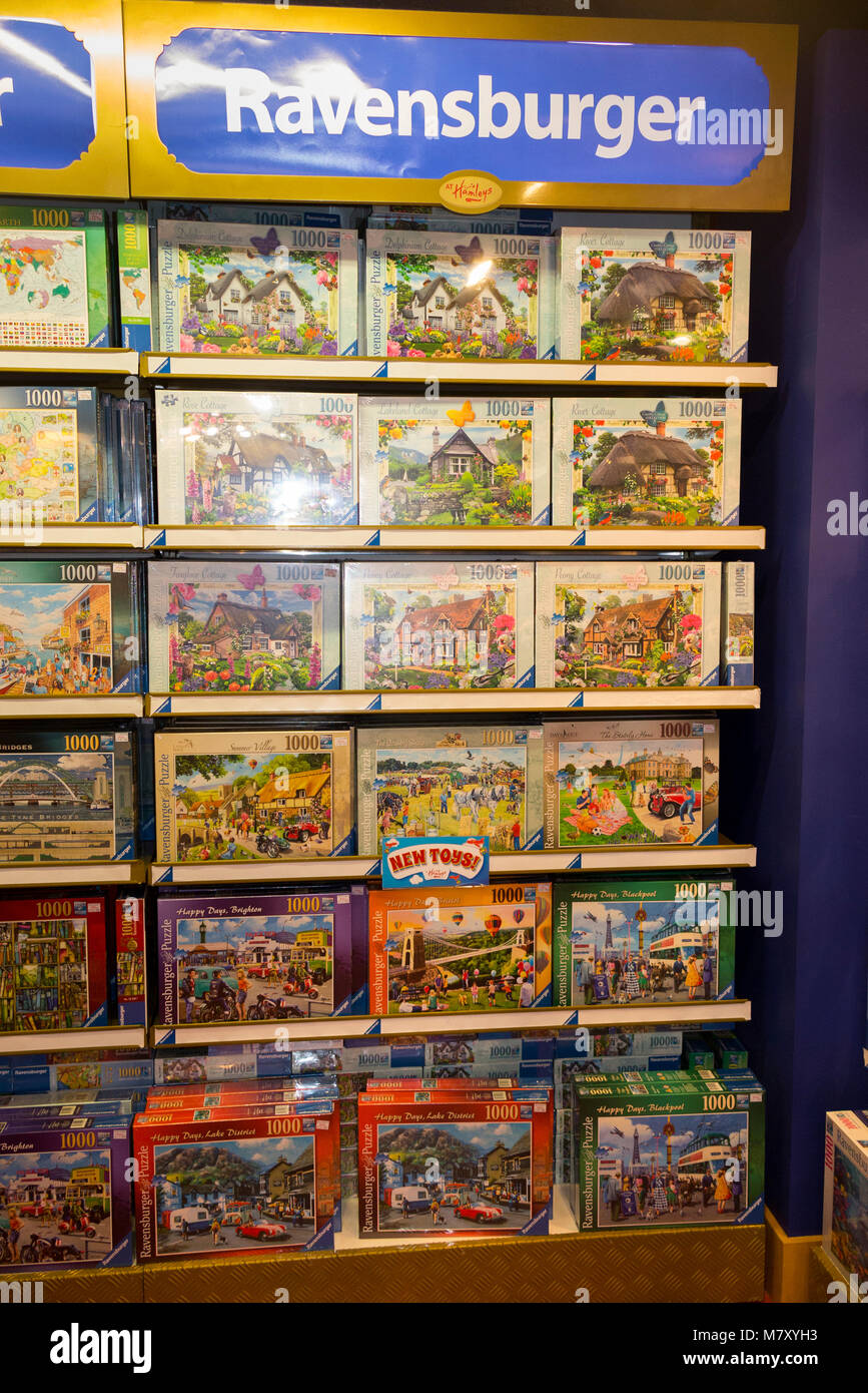Boxes of Ravensburger jigsaw puzzles / jig saw puzzle  on sale in the London toy shop. Regent street. UK. (96) Stock Photo