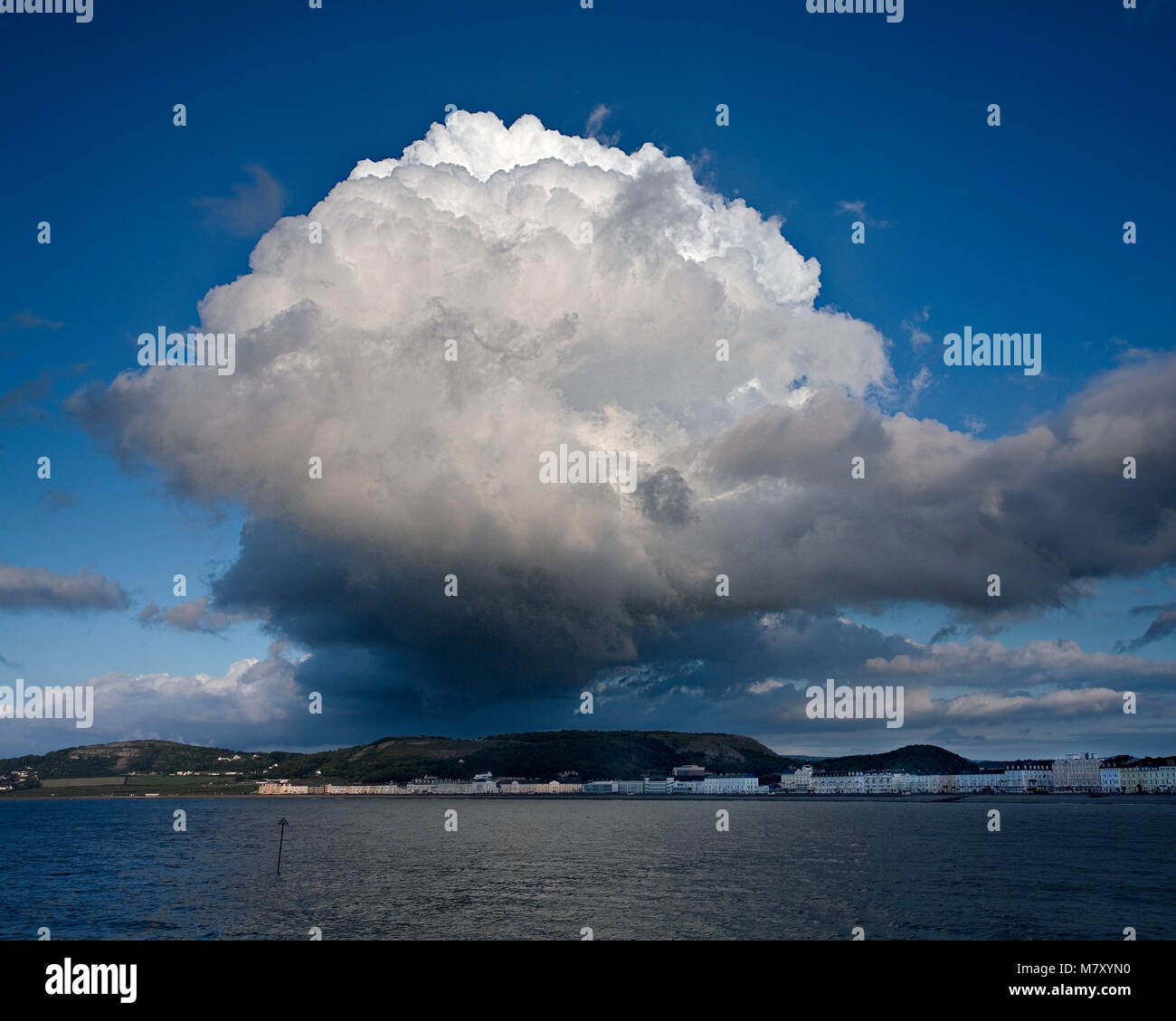 Storm cloud over Llandudno promenade, North Wales coast Stock Photo