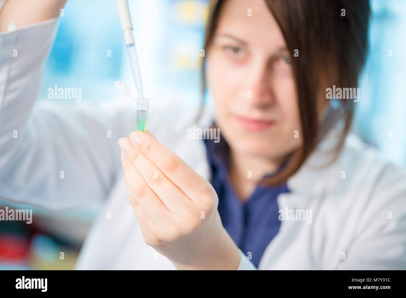 young woman lab assistant in a lab Stock Photo Alamy