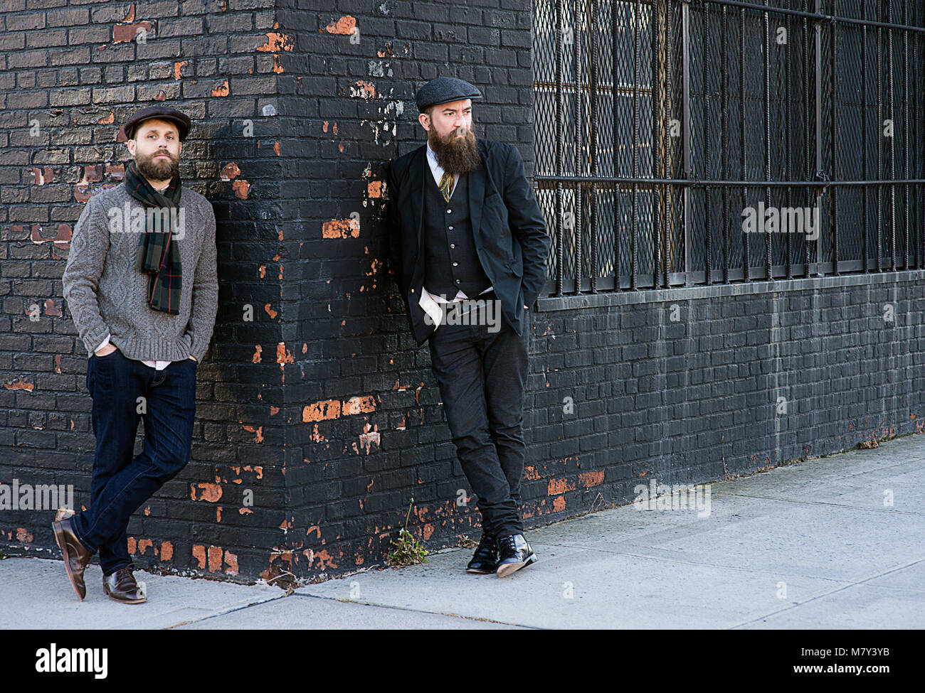 2 men standing on a corner in Brooklyn, New York. Stock Photo