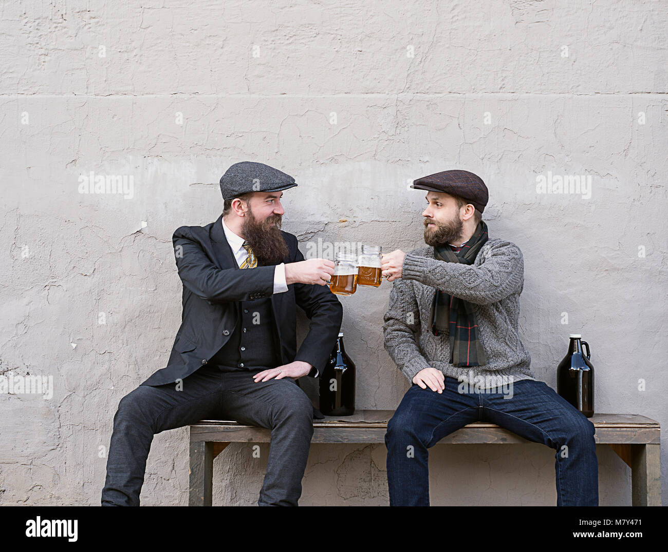 Two men toasting with beer Stock Photo