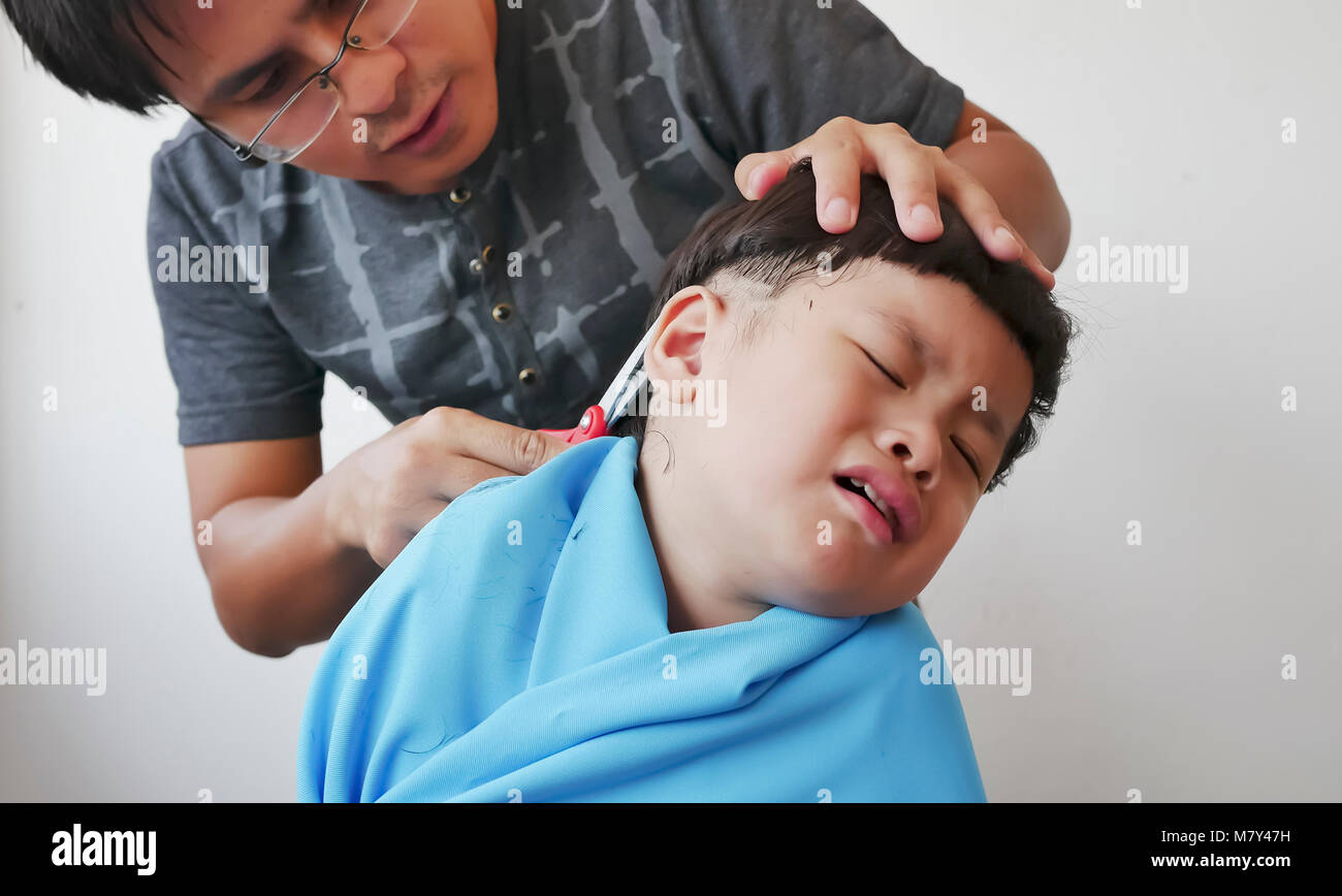 Boy hair cut sad hi-res stock photography and images - Alamy
