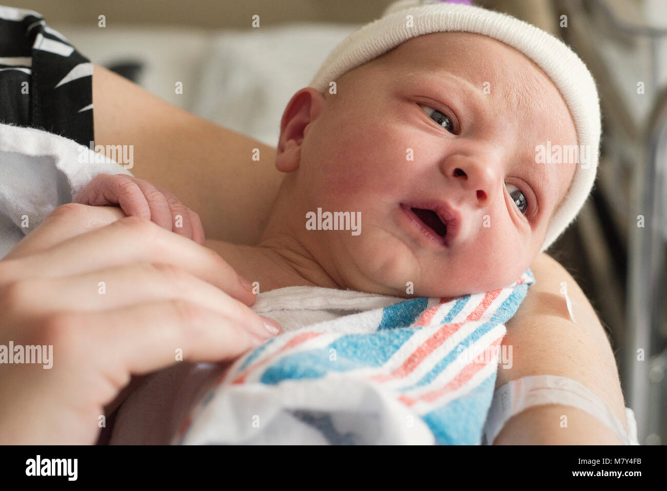 New born baby being held hires stock photography and images Alamy