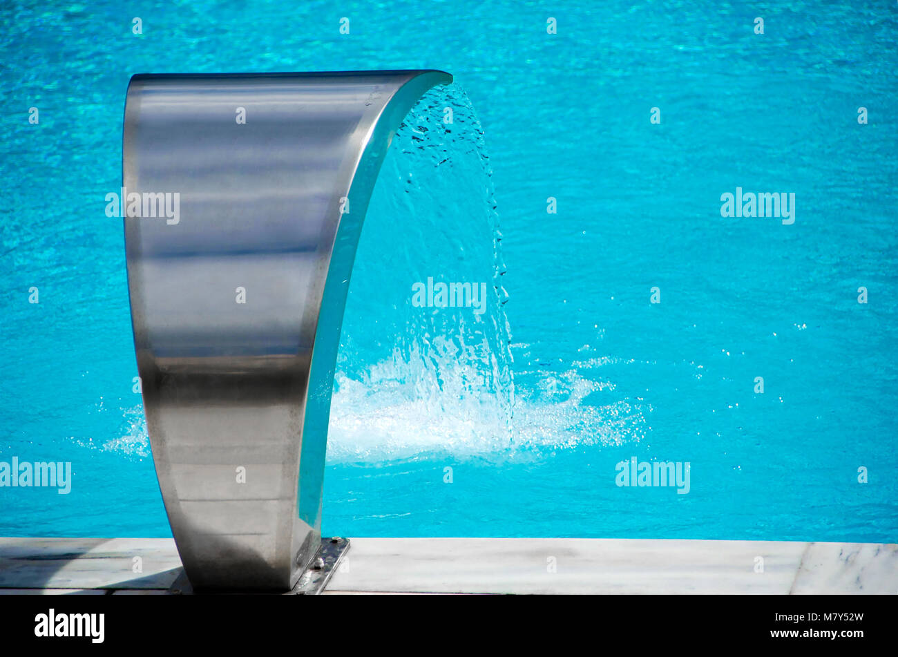 Pool Waterfall Using Jets waterfall jet with jacuzzi in action Stock Photo - Alamy