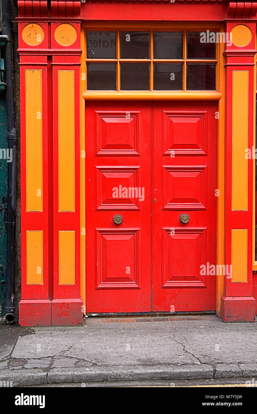bright red and yellow entrance  doorway in skibbereen, west cork. Stock Photo