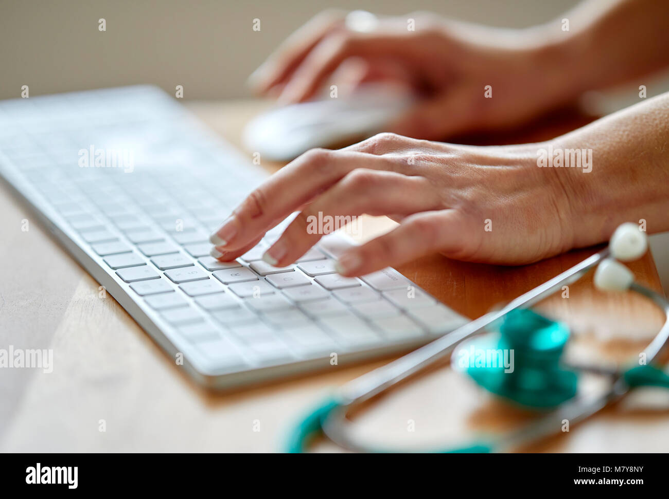 Close up view of keyboard and Stethoscope Stock Photo