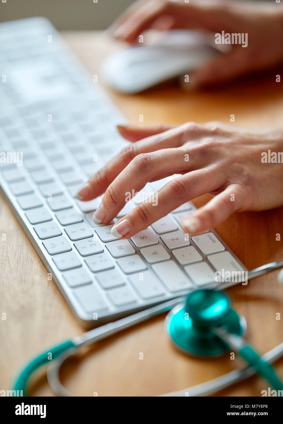 Close up view of keyboard and Stethoscope Stock Photo