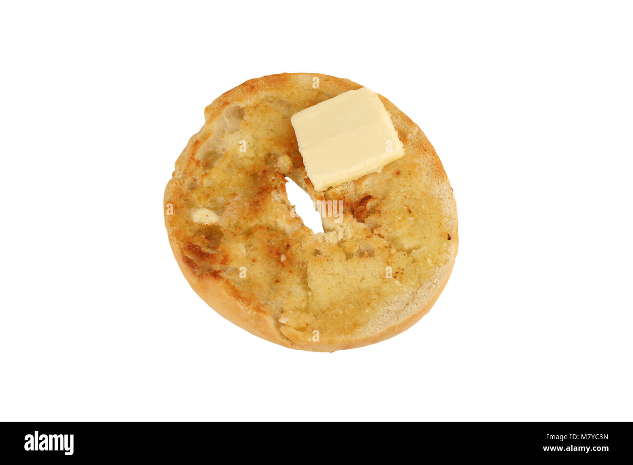 A Isolated Toasted bagel with a pat of butter Stock Photo