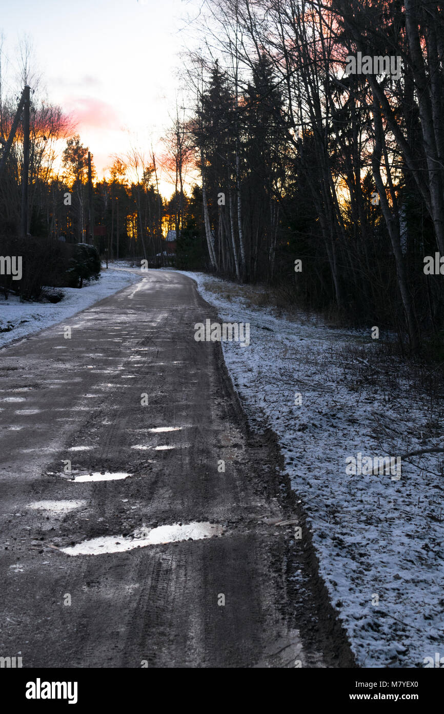 beautiful winter landscape wit road to sunset. Dirty bad road Stock ...