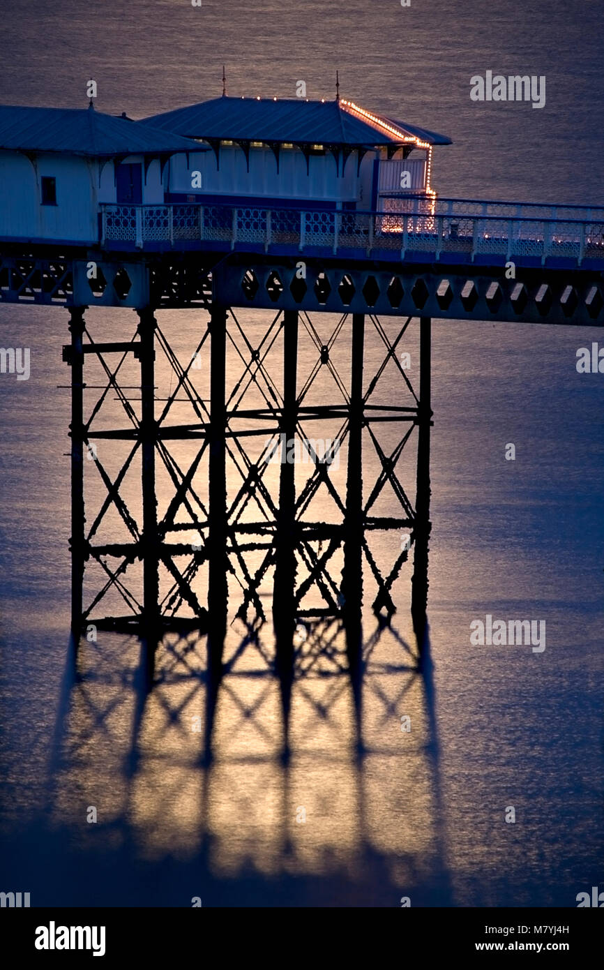 Part of Llandudno pier at night in a patch of moonlight, North Wales coast Stock Photo
