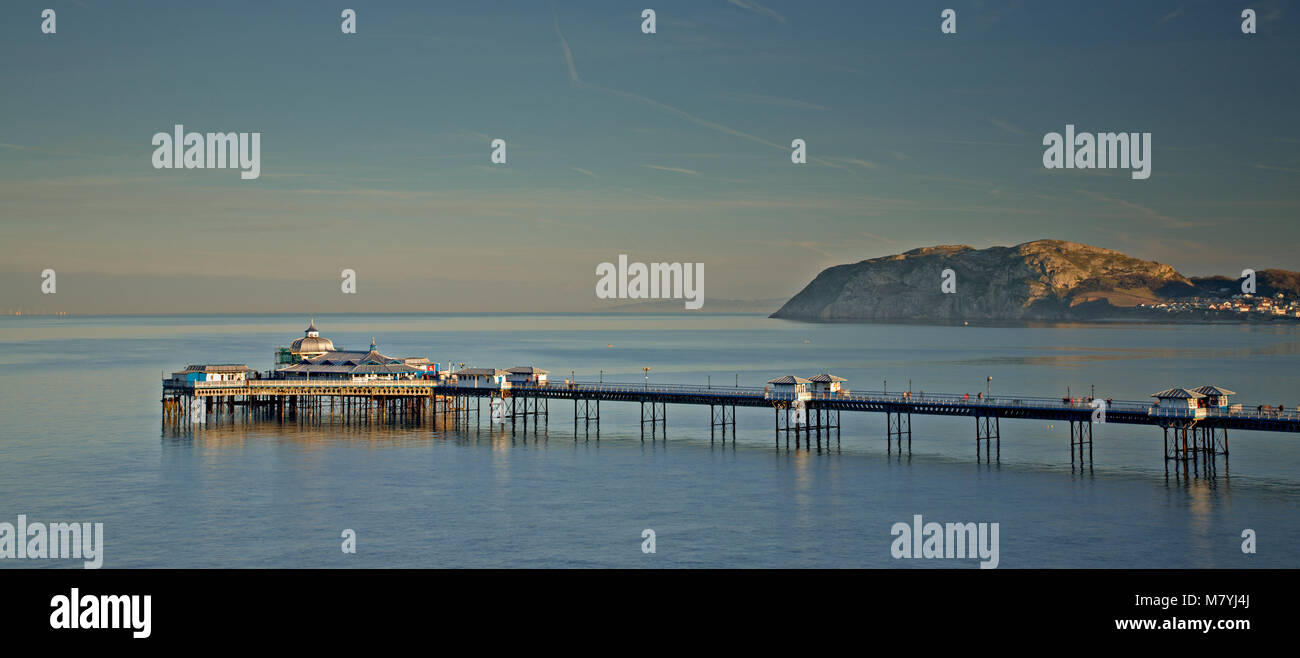 Llandudno pier at sunset on the North Wales coast Stock Photo