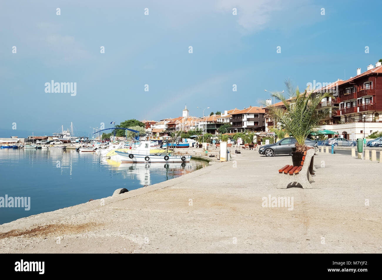 Nessebar, Bulgaria - June 12, 2011: View of the embankment and harbor of the old town of Nessebar with a rainbow, Sunny Beach, Black Sea coast of Bulg Stock Photo