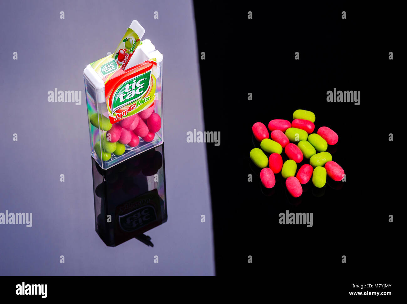 Falling tic tacs isolated on dark background. Tic tacs are manufactured by  Italian confectioner Ferrero and were first produced in 1968 Stock Photo -  Alamy