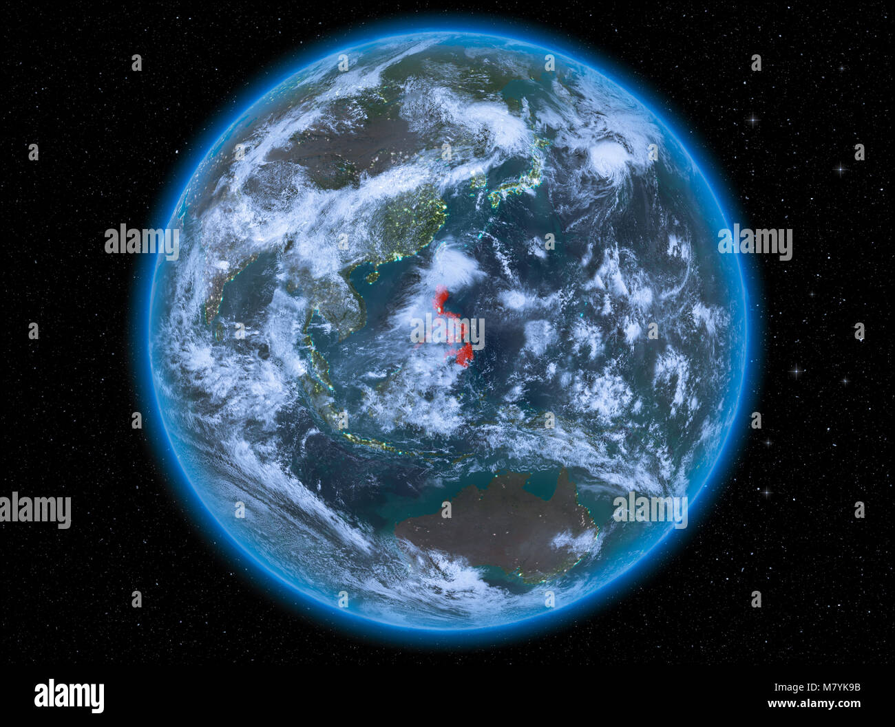 Night view of Philippines highlighted in red on planet Earth with ...