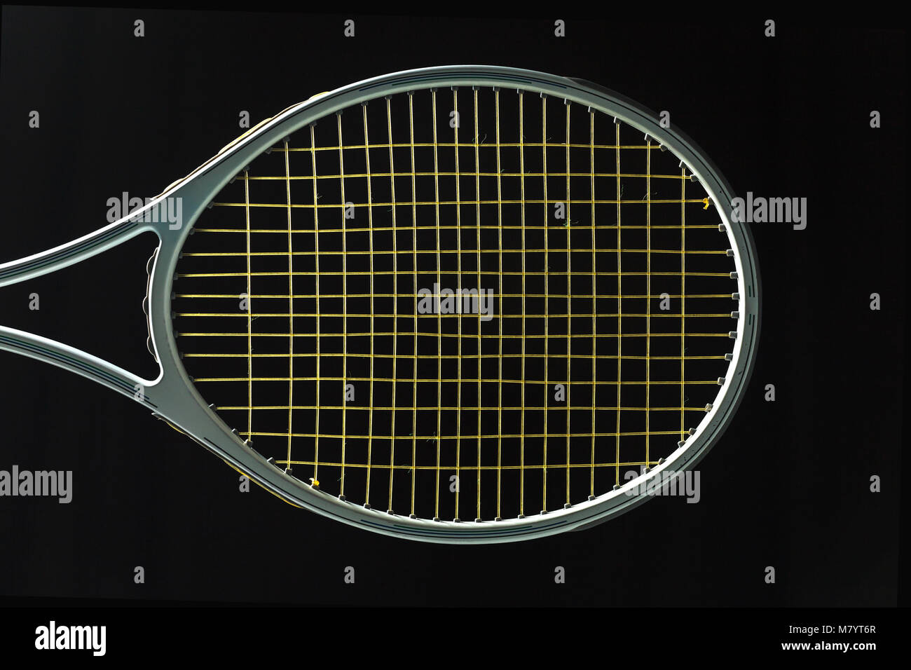 Tennis racket on black background Stock Photo - Alamy