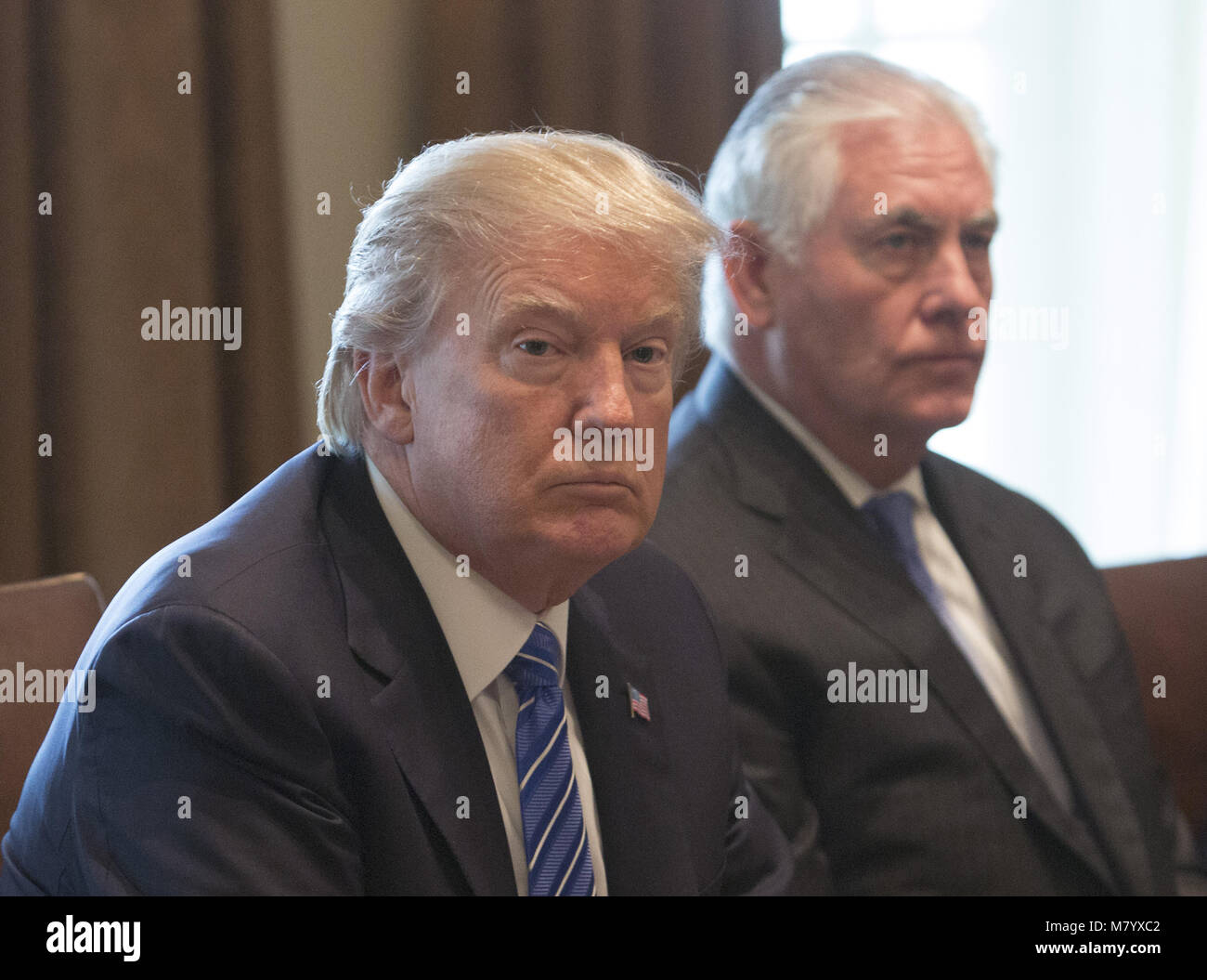 March 13, 2018 - Washington DC, U.S. - (FILE) After 14 months of private tensions and public disputes, President Trump ousted his beleaguered secretary of State, replacing Rex Tillerson with CIA Director Pompeo in a major shake-up of his national security and foreign policy team. Pictured: September 12, 2017 - Washington, District of Columbia, United States of America - United States President Donald J. Trump (left) and US Secretary of State Rex Tillerson(right) listen during a meeting with Malaysia's Prime Minister. (Credit Image: © Chris Kleponis/CNP via ZUMA Wire) Stock Photo