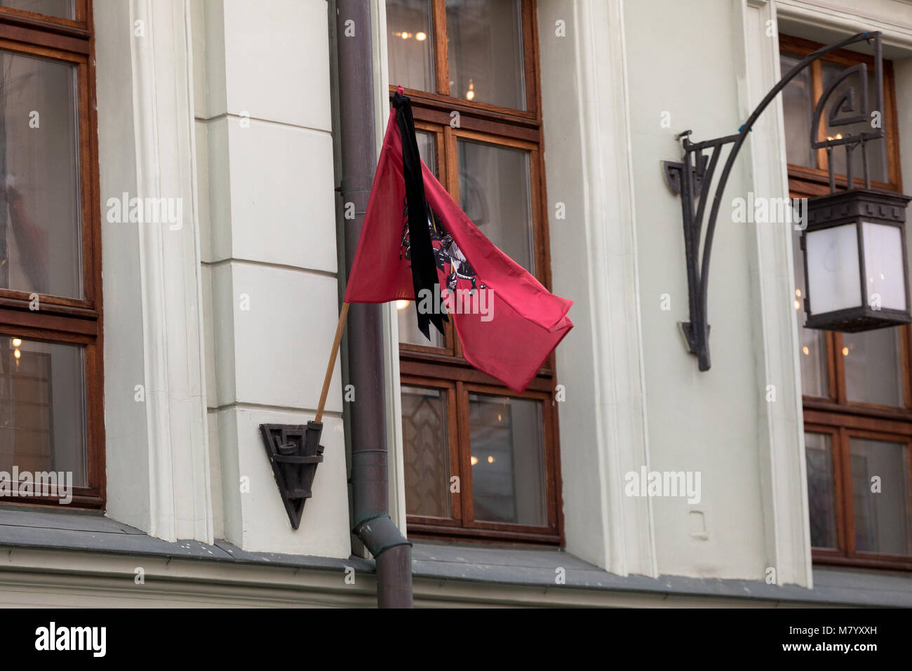 Moscow, Russia. 13th March 2018. Flag of Moscow with mourning ribbon on the facade of the building Moscow Art Theater; its artistic director, Russian actor Oleg Tabakov, died on March 12 in Moscow on the 83rd year of life, after a prolonged illness. Credit: Victor Vytolskiy/Alamy Live News Stock Photo