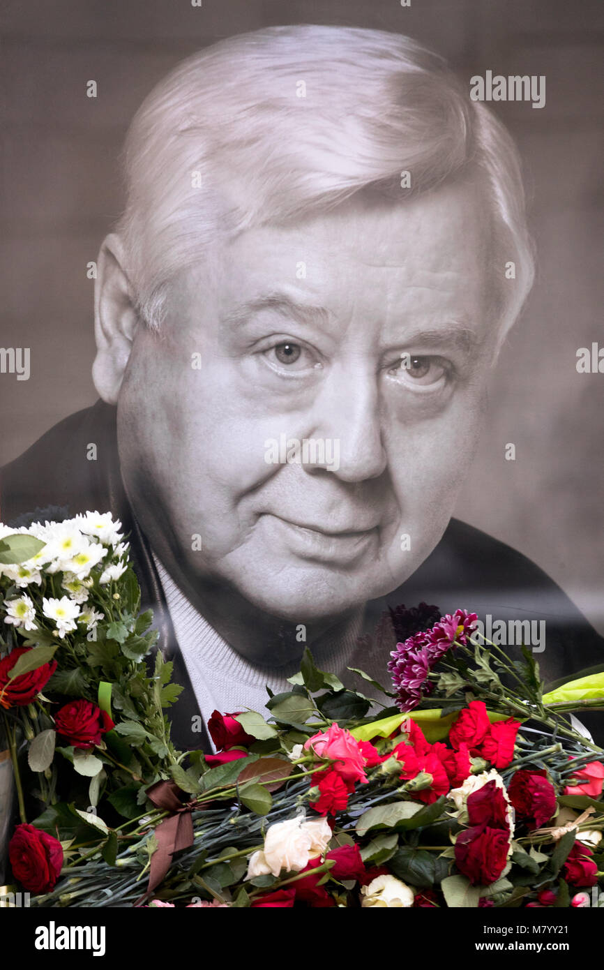 Moscow, Russia. 13th March 2018. Flowers and portrait of Oleg Tabakov, near the main entrance to the Moscow Art Theater; its artistic director, Russian actor Oleg Tabakov, died on March 12 in Moscow on the 83rd year of life, after a prolonged illness. Credit: Victor Vytolskiy/Alamy Live News Stock Photo