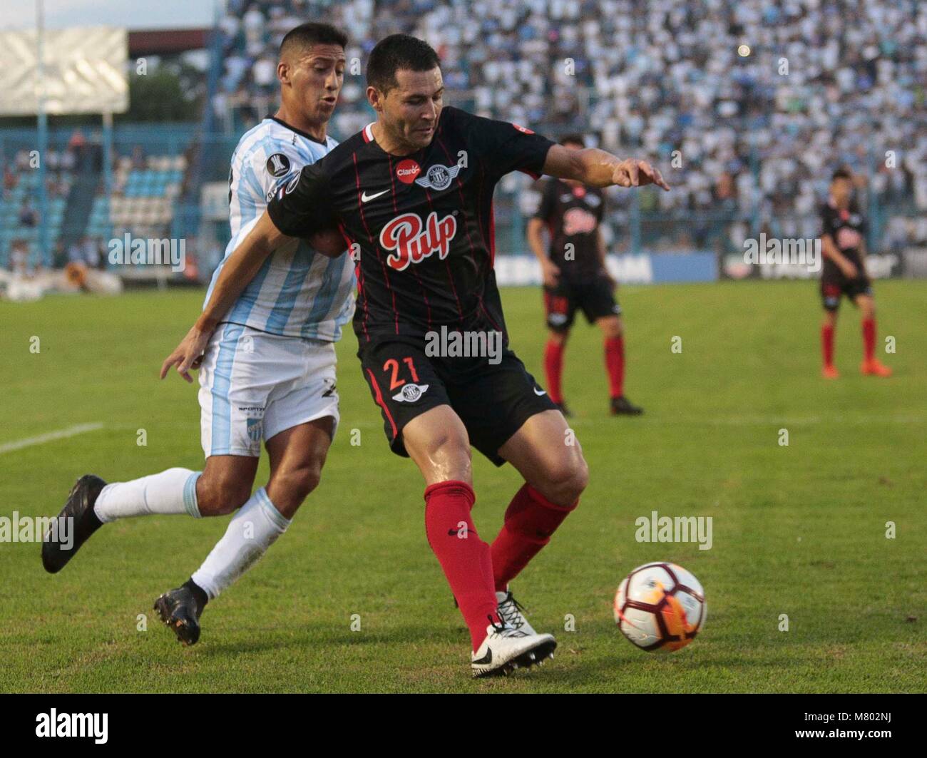 Atletico Tucuman S Rodrigo Aliendro L Vies For The Ball With Libertad S Antolin Alcaraz R During The Copa Libertadores Soccer Match Between Atletico Tucuman Of Argentina And Libertad Of Paraguay At Monumental Jose