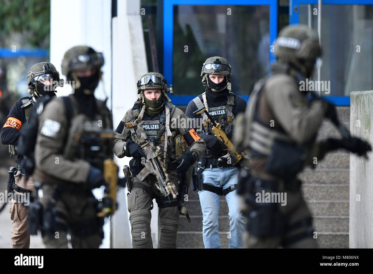 Ludwigshafen, Germany. 14th Mar, 2018. Heavily armed officers of a ...