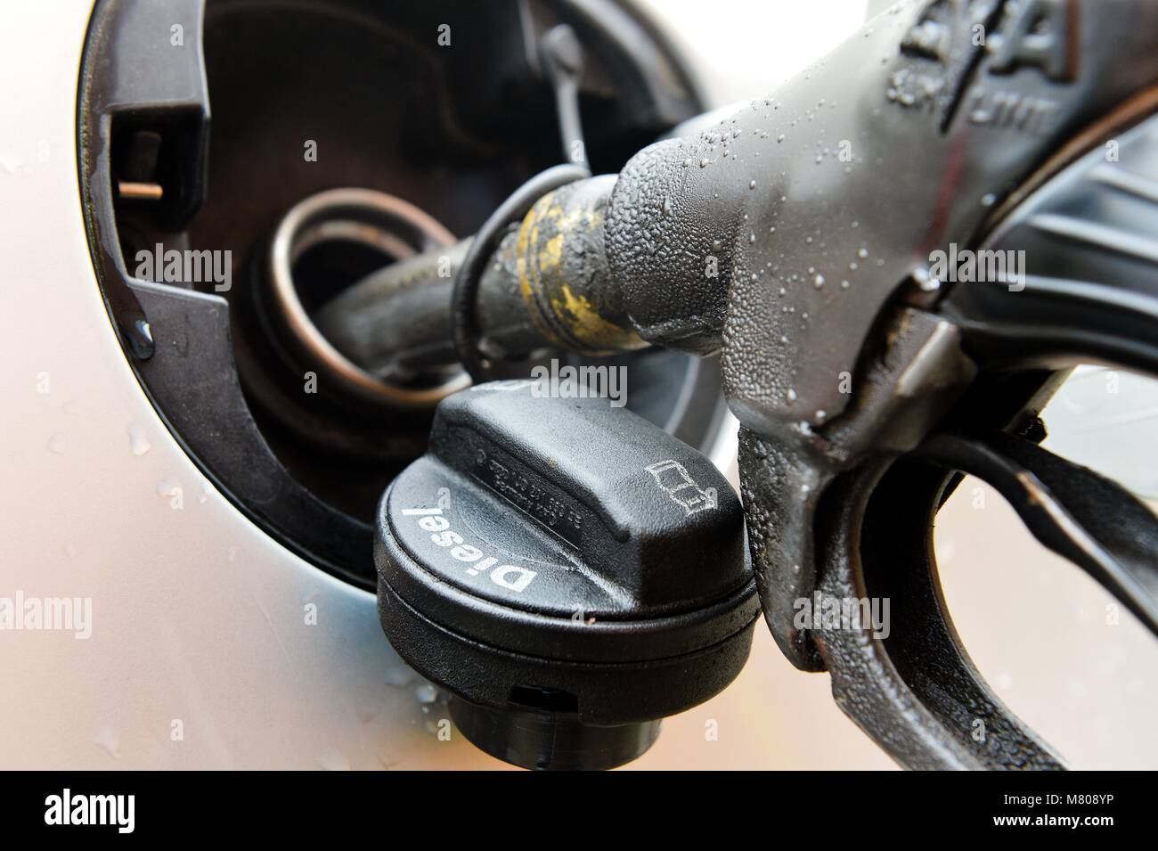 Illustration Diesel car is getting gas, Germany, city of Osterode, 14