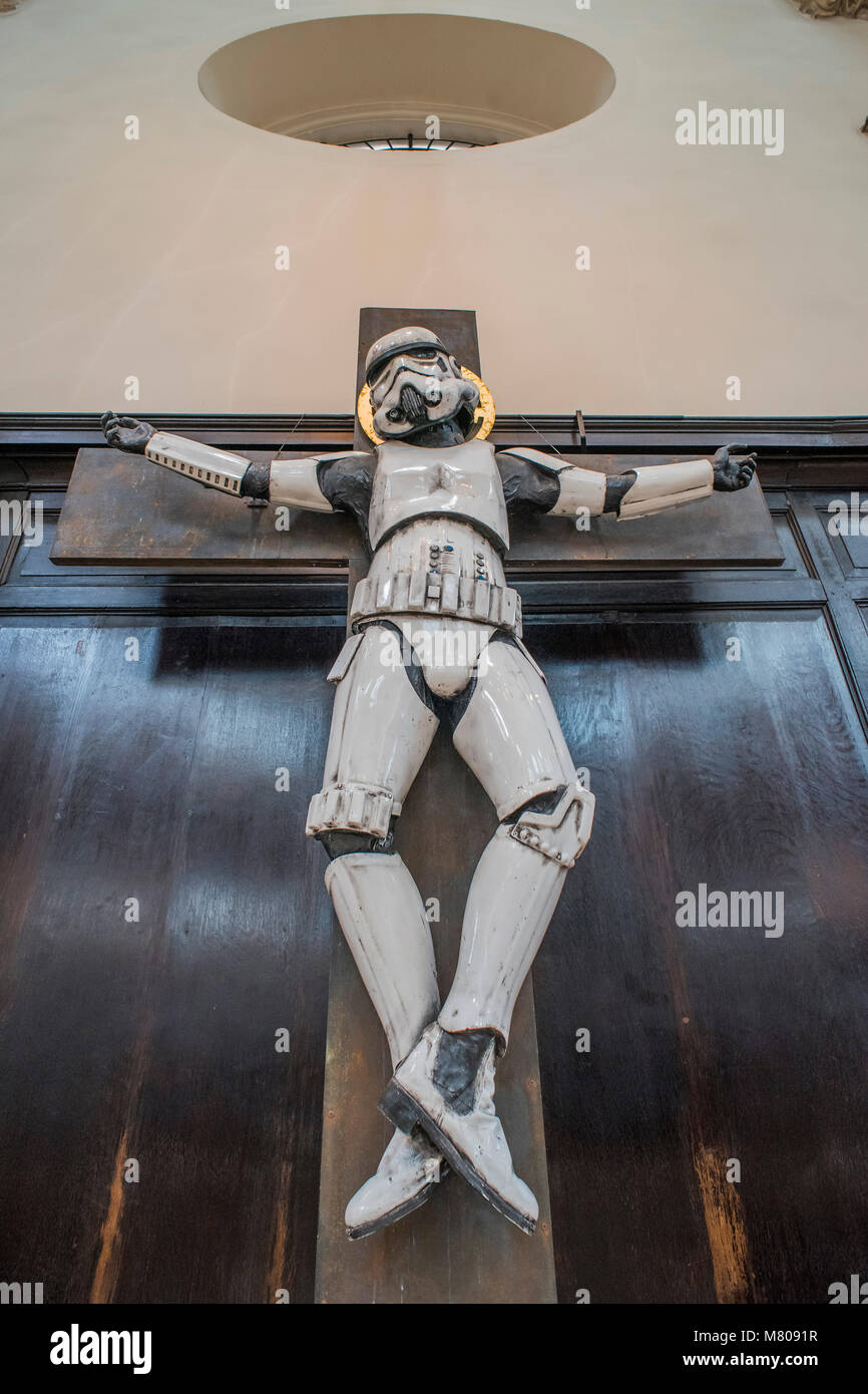 London, UK. 14th March, 2018. ‘Crucified Stormtrooper’ by Ryan Callanan (from the original 1977 Star Wars film - £12000) - Art Below's ‘Stations of the Cross’ Exhibition: A series of crucifixion themed works by 14 artists will be unveiled at London’s St.Stephen Walbrook church on Thursday 15th March. Stock Photo