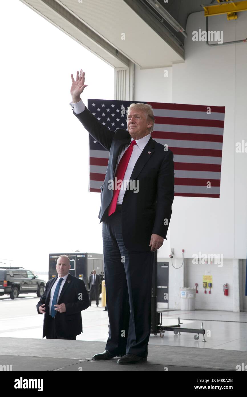 U.S President Donald Trump waves on arrival at Marine Corps Air Station Miramar March 13, 2018 in Miramar, California. Trump made a quick day trip to California, his first since becoming president. Stock Photo