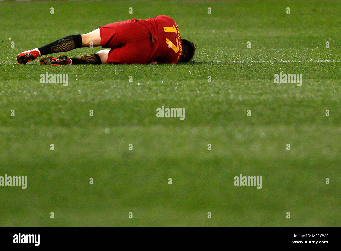 Cengiz Roma Roma s Cengiz Under lies on the pitch after being injured during the ...