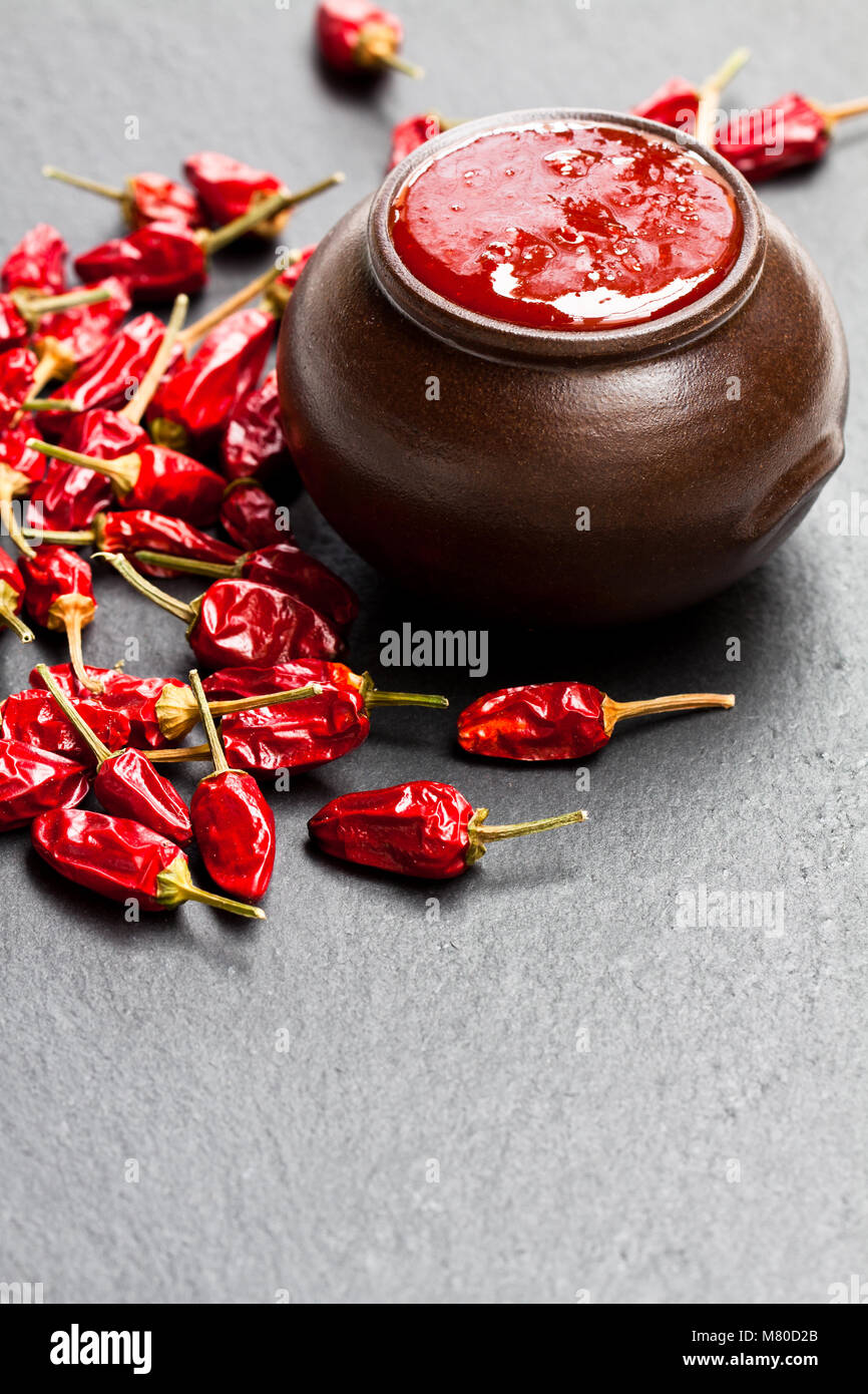 Hot  sauce from chilli peppers and tomatoes Stock Photo