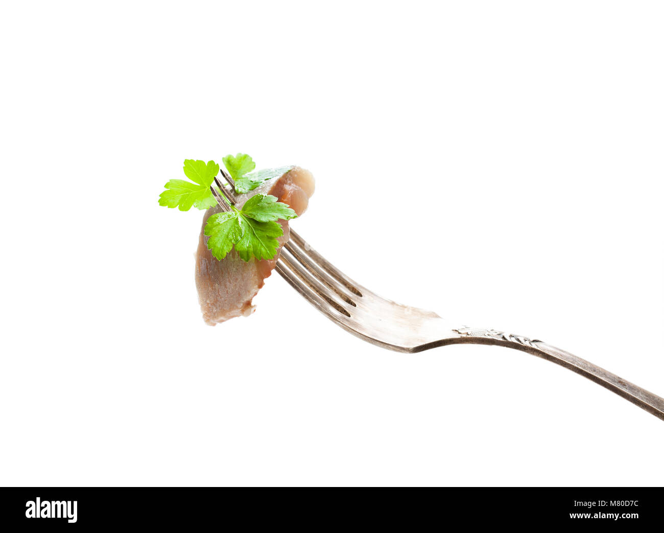 sliced salted herring on vintage fork Stock Photo Alamy