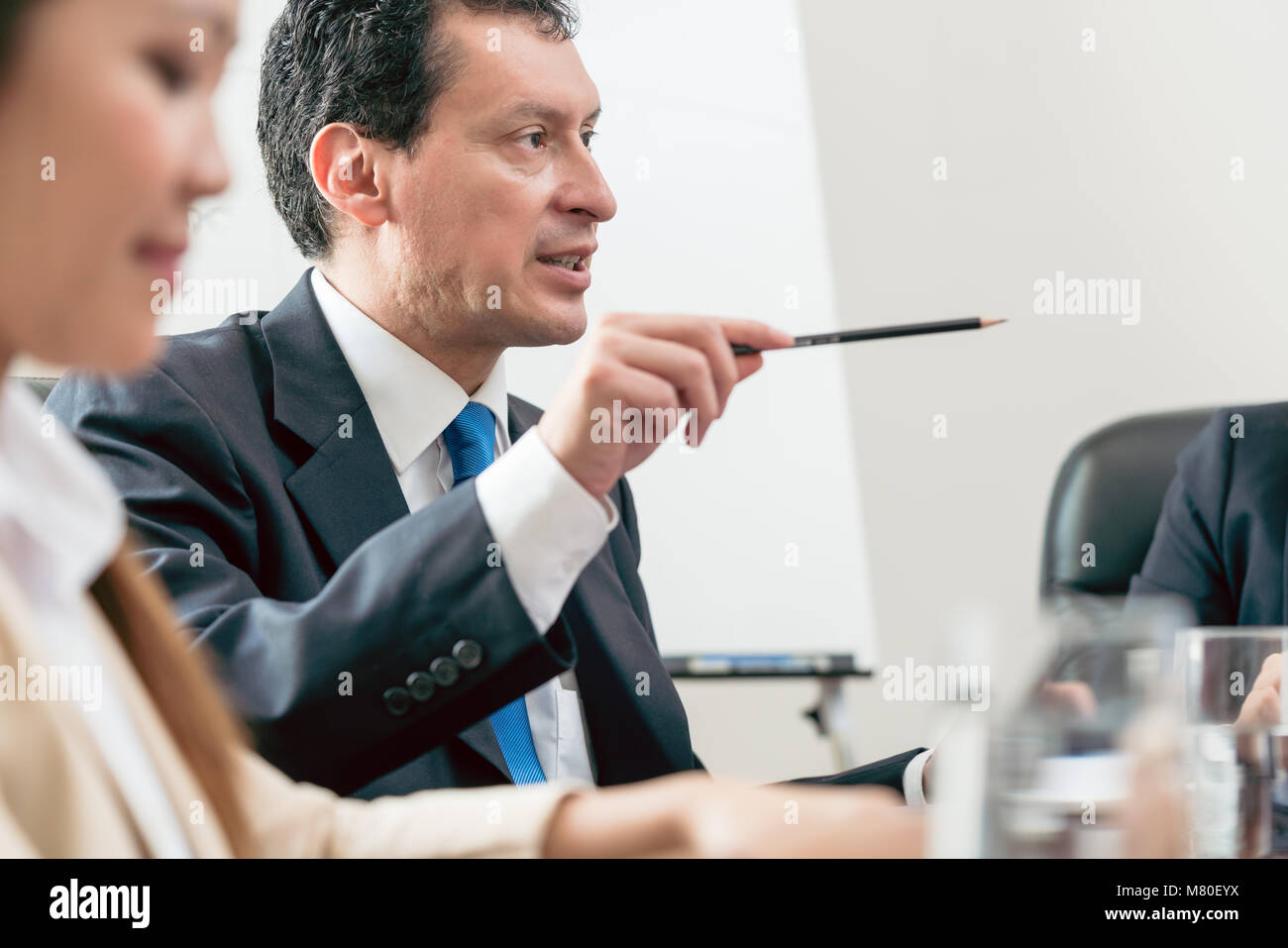 Expert businessman sharing his view during a decision-making meeting Stock Photo