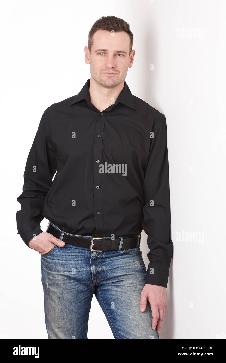 Man with black shirt hi-res stock photography and images - Alamy