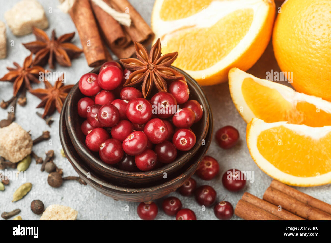 Ingredients for cooking traditional spicy winter drinks cranberry
