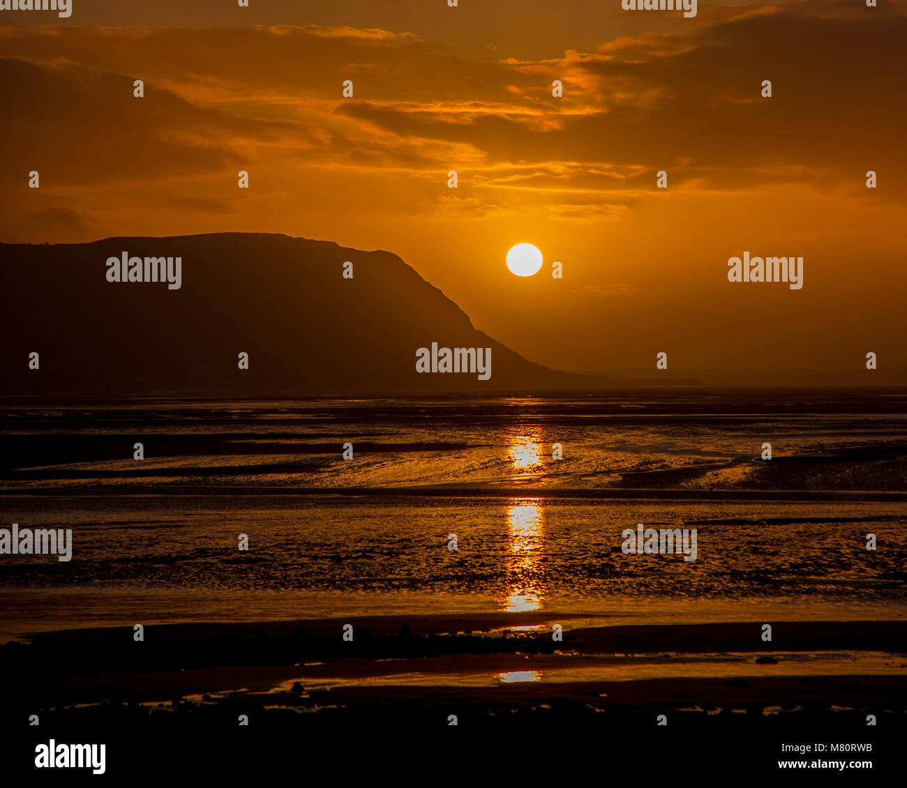 Sunset over the West Shore at Llandudno on the North Wales coast Stock Photo